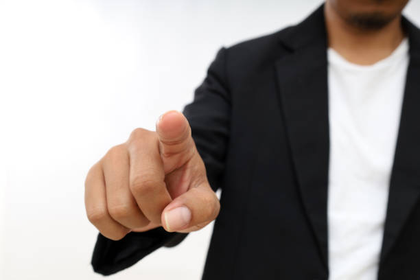 Businessman hand touching empty virtual screen, modern business background concept. Isolated on white