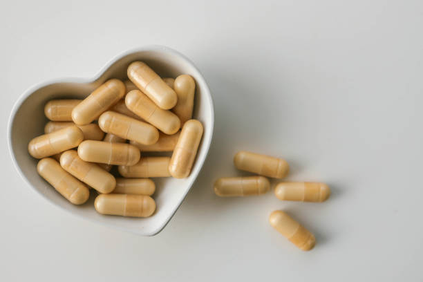 istock Vitamin capsules for the heart top view 2184174621