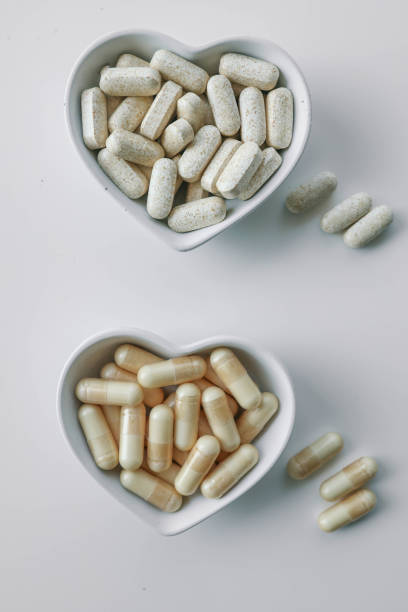 istock Tablets and vitamins on white background, banner advertising, pharmaceuticals 2184174622