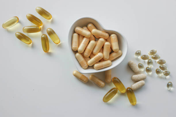 istock Tablets and vitamins on white background, banner advertising, pharmaceuticals 2184174623
