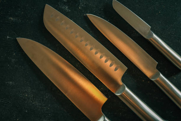 istock Casting steel various chef knife, Set of modern sharp kitchen knives on dark background 2184175614