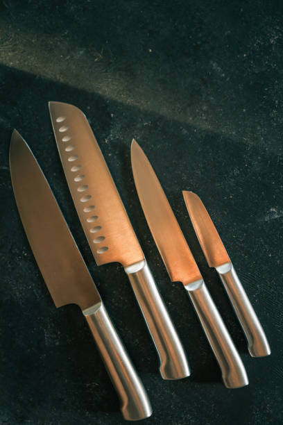 istock Casting steel various chef knife, Set of modern sharp kitchen knives on dark background 2184175621