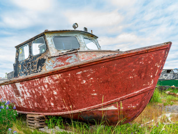 istock Weathered old wood boat painted red 2184176531
