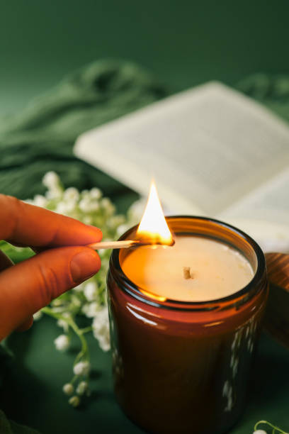 istock Girl lights a candle, spring aesthetics 2184178108