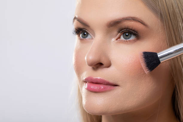 istock Experience the Art of Glamorous Makeup Application Featuring Beautiful Blush Techniques 2184178699