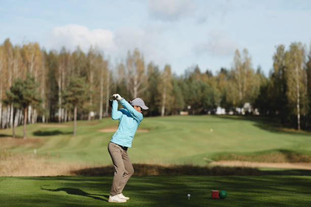 istock Golfer women sport course golf ball fairway 2184182056