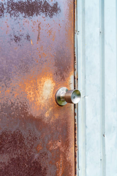 istock Corrugated wall and rusted door materials. 2184183147