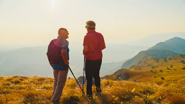 istock Active Senior Couple on Hike in Nature 2184183317