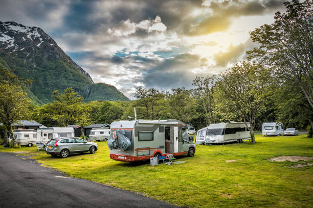 Camper trailers, camper at camping site in beautiful Norwegian nature