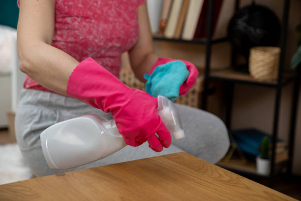 istock A cleaning routine is essential for disinfecting a wooden table with the right supplies 2184185846