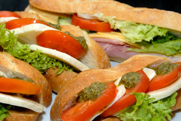 istock A fresh caprese sandwich with ripe tomatoes, mozzarella, and basil pesto 2184186056