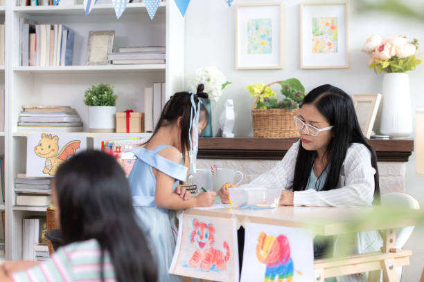 istock A group of special students doing learning activities in a special classroom 2184187323