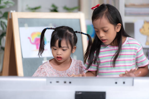 istock Portrait of special students doing learning activities in a special classroom 2184187667