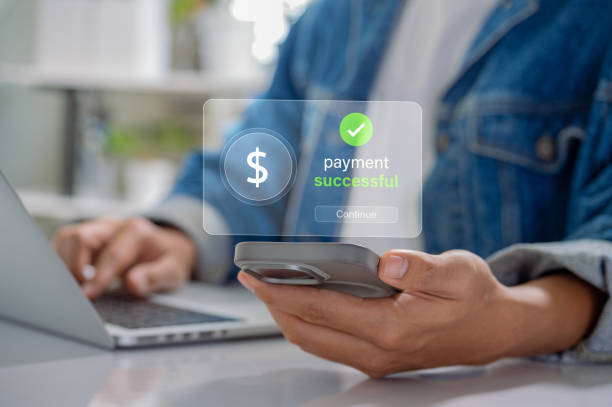 istock Mobile Finance and Secure Transaction. Payment Success Notification on Smartphone, Highlighting Safe, Convenient Digital Banking and Advanced Financial Technology Solutions 2184191682