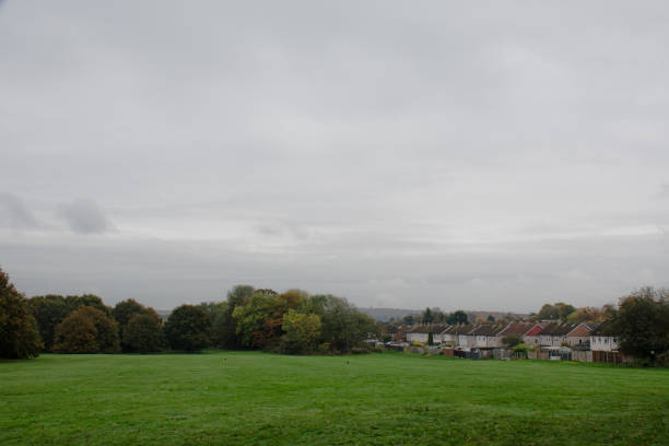 istock field with council housing run around the outside 2184192236