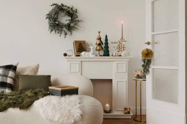 istock Minimalist Christmas setup featuring delicate ornaments, stars, and warm lighting. A modern take on holiday traditions. 2184192644