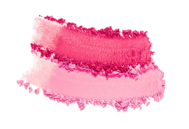 Cosmetic pink two colors palette set blusher or eye shadow smear pink shimmer dry loose powder texture on white isolated background