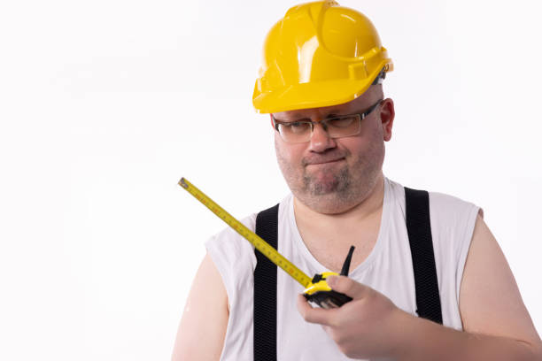 Emotional man in orange paint construction industry work lifestyle. High quality photo
