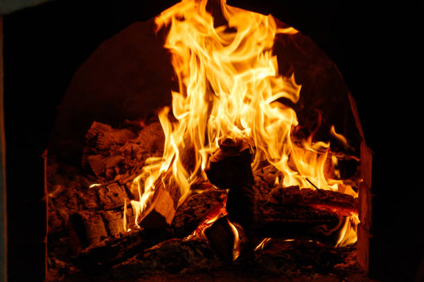 istock A fire is burning in a wood burning oven 2184198717