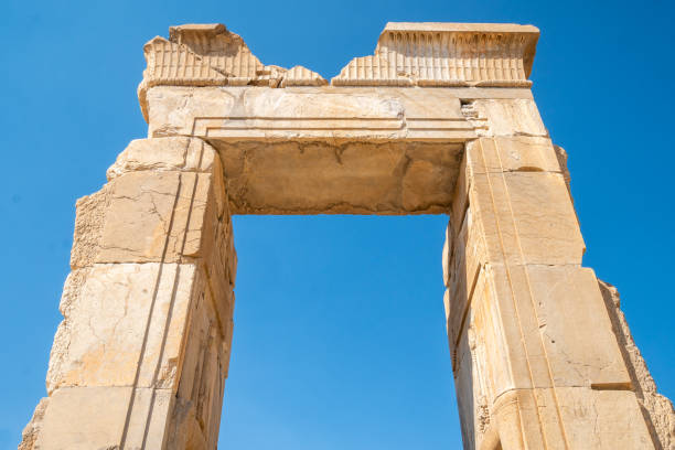 istock Persepolis, beautiful stone archway stands tall with a blue sky, Iran 2184198738