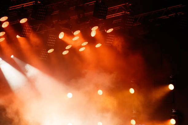 istock Red-orange color on stage at a concert 2184200007