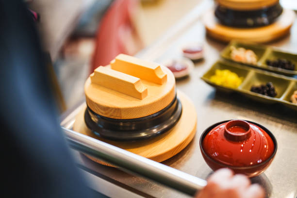 Serving Korean Food with service tray in restaurant.