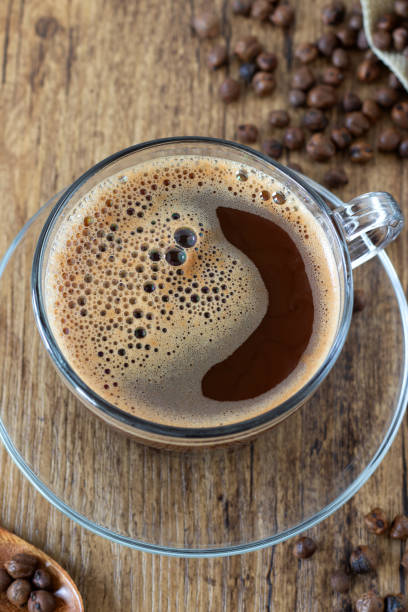 istock Cup of roasted chickpea coffee on wooden table, top view 2184206160