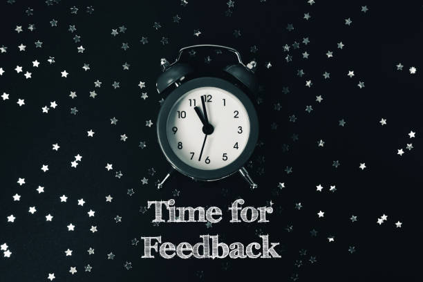 istock Black and white clock with the time of 10:30 on it 2184208245