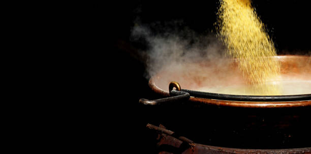istock Flour thrown into the pot becomes polenta 2184209417