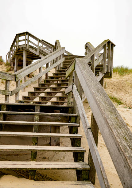 old rusted steps leading down to a river