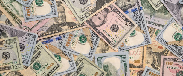 istock Us USD dollar bills as finance background 2184213528