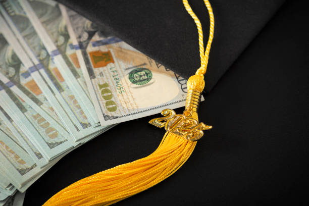 istock Class of 2025 Tassel With US Cash Dollars 2184213657