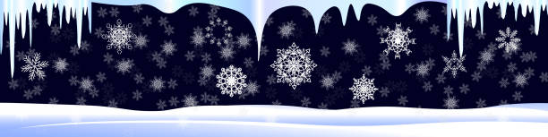 istock snow, snowflakes are falling and icicles are hanging 2184214777