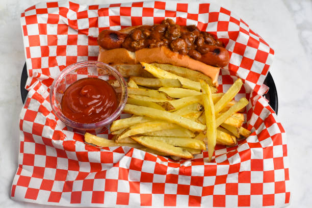istock hot dog top with chilli  wioth fries 2184219842