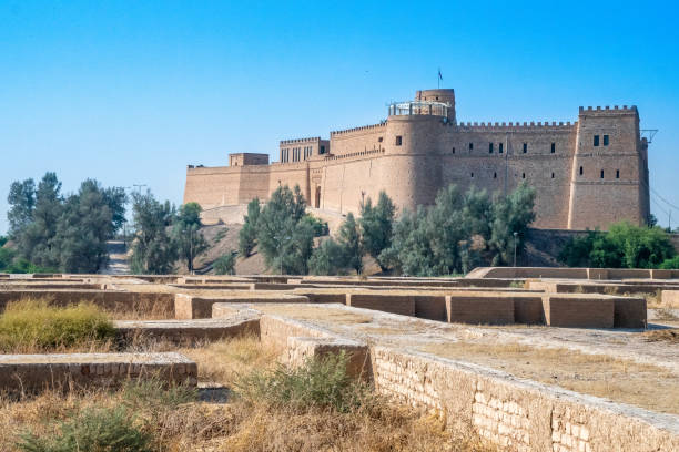 istock A large castle sits atop a hill, surrounded by trees and greenery, Shush, Iran 2184219848