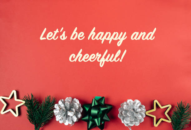 istock Red background with a white and green bow and a silver star 2184220285