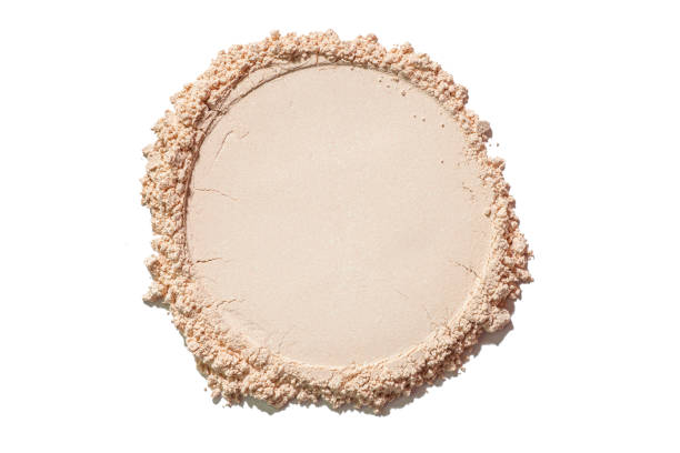 istock Cosmetic product beige pressed or loose powder texture swatch isolated on white 2184222202
