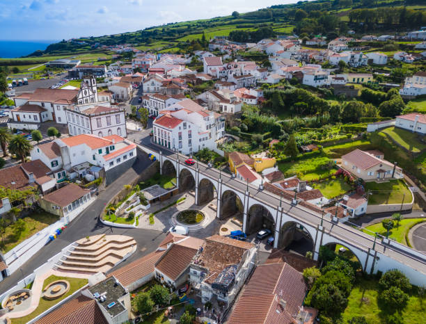 istock Ponte dos Sete Arcos old stone arch bridge in Nordeste town. Aerial drone view 2184222595