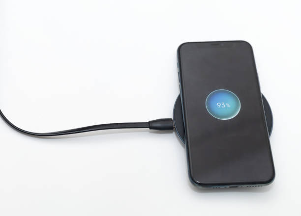 istock the phone is charged by wireless charging 2184223081
