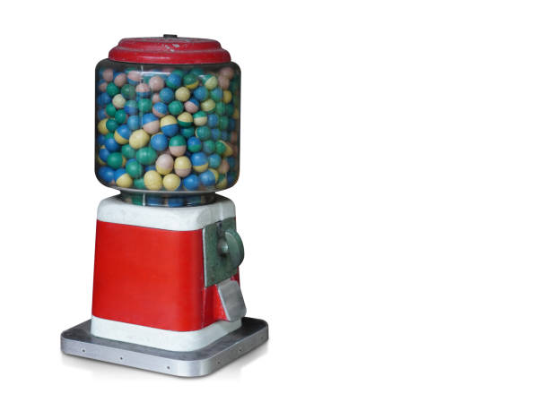 istock side view antique red and white gumball machine on white background, object, play, toy, decor, fashion, copy space 2184223323