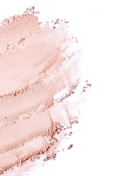 istock Cosmetic product beige pressed or loose powder texture swatch sample background 2184223326