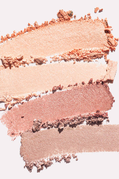 istock Cosmetic product beige pressed or loose powder texture swatch sample background 2184223425