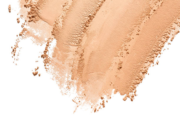 istock Cosmetic product beige pressed or loose powder texture swatch sample background 2184224600