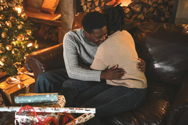 istock young couple wrapping christmas presents 2184225203