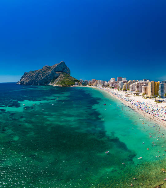 istock Mediterranean beach. Mountain Penyal d'Ifach. Calpe beach, Spain. 2184225267