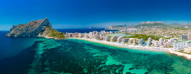 istock Mediterranean beach. Mountain Penyal d'Ifach. Calpe beach, Spain. 2184225285