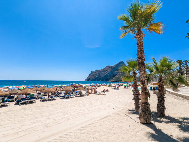 istock Mediterranean beach. Mountain Penyal d'Ifach. Calpe beach, Spain. 2184225286