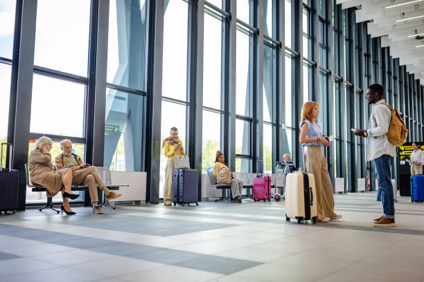 istock Dynamic airport terminal scene with vibrant travelers 2184229357
