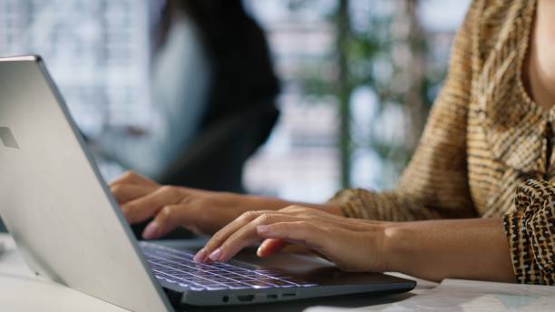 istock Confident skilled entrepreneur seated at her corporate office desk 2184231505