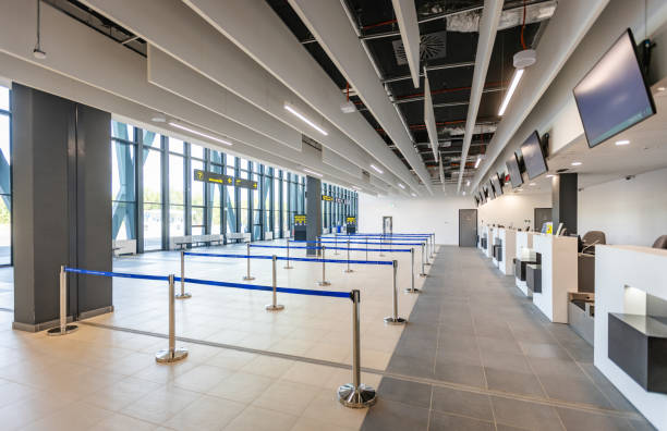 istock Minimalistic airport terminal with check-in and seating area 2184235425